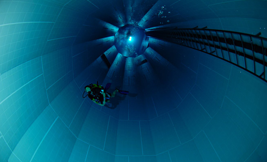 a diver exploring the depths of Nemo 33