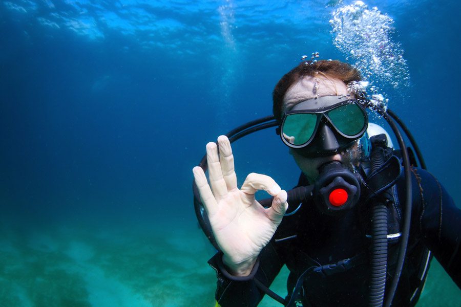 scuba diver wearing a diving mask