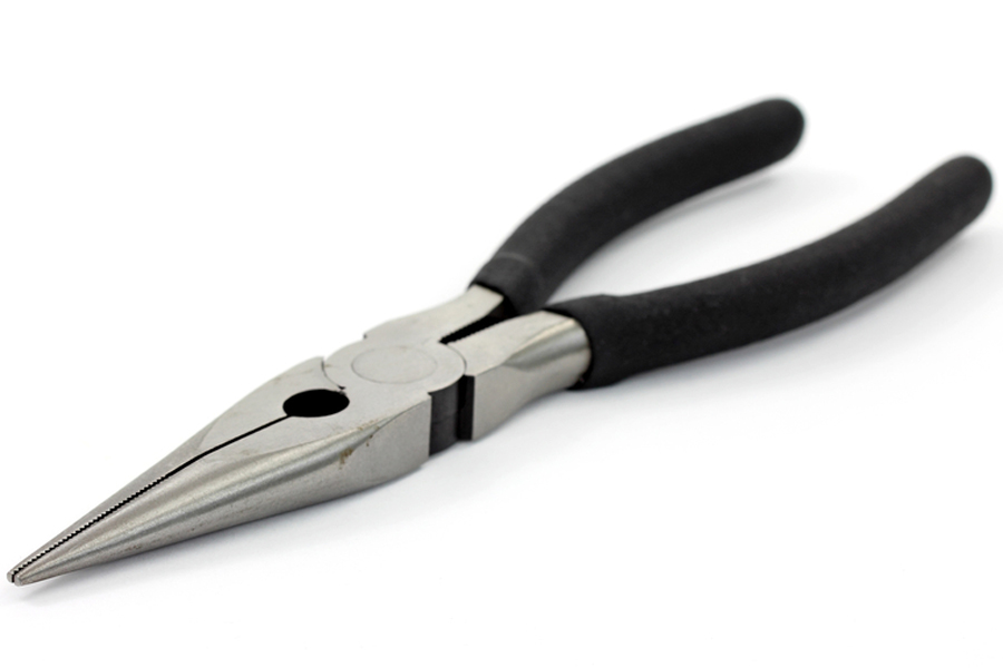 Needle nose pliers on white surface and background